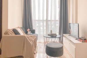 Elegant and Nice 2BR at Menteng Park Apartment By Travelio
