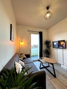 Appartements LE PAISIBLE - Parking gratuit - Entree ville : photos des chambres
