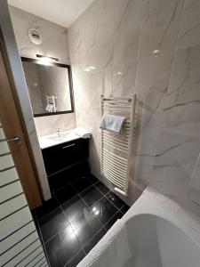 Appartements LE PAISIBLE - Parking gratuit - Entree ville : photos des chambres