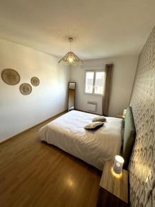 Appartements LE PAISIBLE - Parking gratuit - Entree ville : photos des chambres