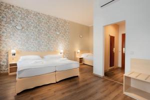 Standard Triple Room with Wellness Access room in Wine Wellness Hotel Amande Hustopeče