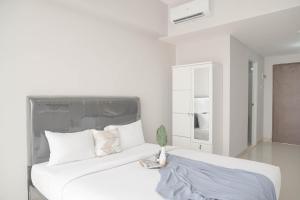 Best Deal and Homey Studio Apartment Majestic Point Serpong By Travelio