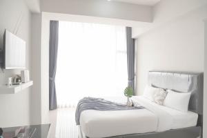 Best Deal and Homey Studio Apartment Majestic Point Serpong By Travelio