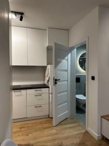 Nowoczesny apartament z ogrodem