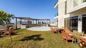 Vogue Vacation Homes, Arjan Jwelz by Danube near Miracle and Butterfly Garden, Studio Apartment with Balcony and Vibrant Community View, Access toAmenities