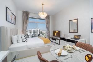 Vogue Vacation Homes, Arjan Jwelz by Danube near Miracle and Butterfly Garden, Studio Apartment with Balcony and Vibrant Community View, Access to all Amenities