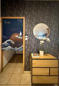 Appartements Le Soleil-Levant centre-ville : photos des chambres