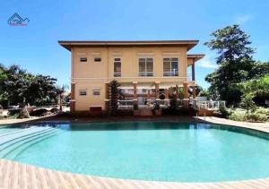Group Staycation in Palawan with Balcony & Free Pool Access up to 5pax - B2 5DiamondB