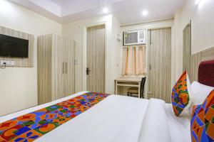FabHotel Taugan Inn - Nr Yashobhoomi Convention Centre