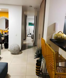 Apartamento con aire, hamaca, piscina y gym