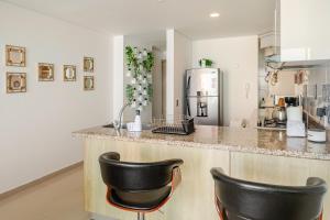 Paraíso Costero Apartamento de Lujo con Vista Directa al Mar