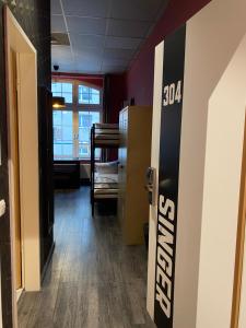 Bed in 3-Bed Dormitory with Private Bathroom room in Singer109 Hotel & Apartment