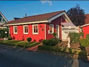 Rotes Ferienhaus im charmanten Schwedenhausviertel - Lähden