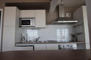 Bord de plage, appartement pour 12, vue mer