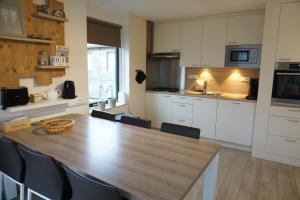 Kustverhuur, Park Schoneveld, Stern 234 met eigen elektrische laadpaal