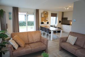 Kustverhuur, Park Schoneveld, Stern 234 met eigen elektrische laadpaal