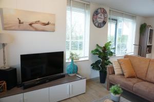 Kustverhuur, Park Schoneveld, Stern 234 met eigen elektrische laadpaal