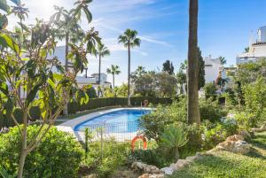 Pool and garden apt by Costarentals - Ref 253