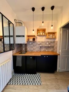 Appartements Suite en ville : photos des chambres