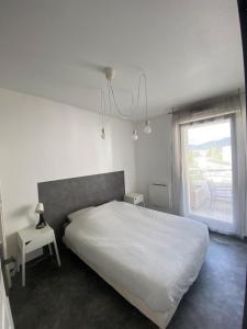 Appartements U1 Chaleureux appartement avec balcon a Uffholtz : photos des chambres