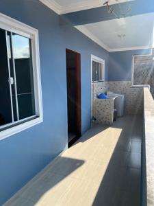 Casa azul alto padrão