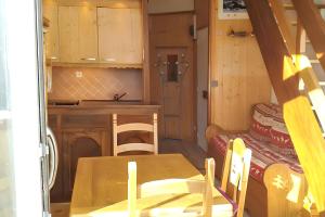 Appartement charmant à Les Menuires, 36 m², vue montagne.