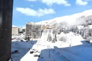 Appartement charmant à Les Menuires, 36 m², vue montagne.