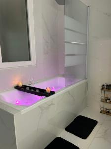 Appartements Appartement avec jacuzzi : photos des chambres