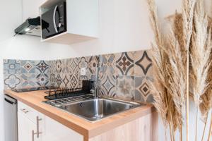 Appartements - Apparts nets a prix honnete - : photos des chambres