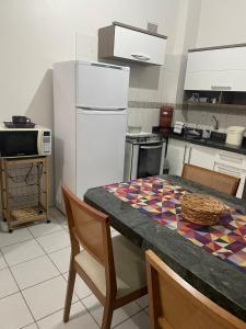 Apto térreo a uma quadra do mar