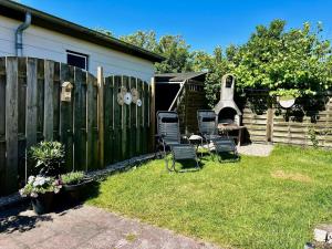 Bungalow in park with fenced garden