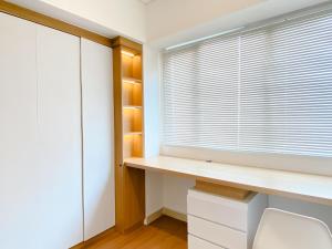 Spacious and Homey 2BR with Work Space at Meikarta Apartment By Travelio