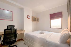 Good Place and Cozy 2BR Apartment at Gateway Ahmad Yani Cicadas By Travelio