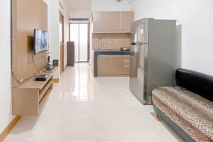 Good Place and Cozy 2BR Apartment at Gateway Ahmad Yani Cicadas By Travelio