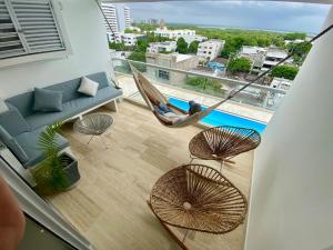 Suite de Lujo frente al Mar-Piscina & Jacuzzi en Edificio Cartagena Beach & Exclusive Resort- Aeropuerto a 5min caminando