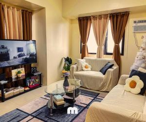 Serin East 1BR Condo w Netflix, PS4 Free Parking - 3hvězdičkové hotely ve městě Tagaytay