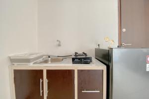 Simply Look 1BR at Boutique Kemayoran Apartment By Travelio