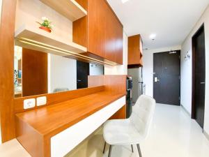 Good and Restful Studio at Patraland Amarta Apartment By Travelio