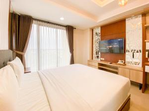 Good and Restful Studio at Patraland Amarta Apartment By Travelio