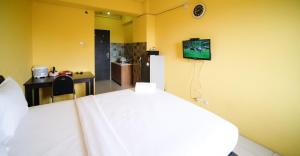 Simple Studio at Menara Rungkut Apartment By Travelio