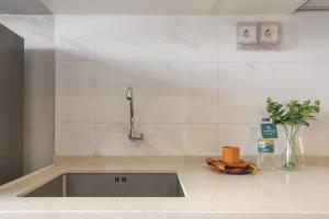 Calma Studio III at Skyhouse Apartment