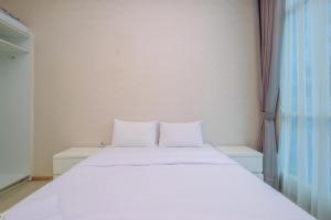 Elegant and Comfy 2BR Apartment at Casa Grande Residence By Travelio