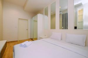 Elegant and Comfy 2BR Apartment at Casa Grande Residence By Travelio