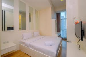 Elegant and Comfy 2BR Apartment at Casa Grande Residence By Travelio