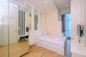 Elegant and Comfy 2BR Apartment at Casa Grande Residence By Travelio