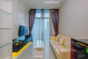 Elegant and Comfy 2BR Apartment at Casa Grande Residence By Travelio