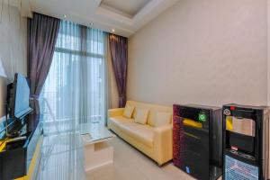 Elegant and Comfy 2BR Apartment at Casa Grande Residence By Travelio