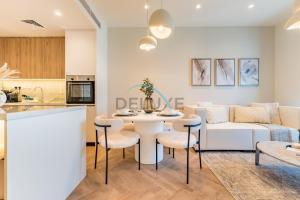 Upgraded 1BR Overlooking Palm Jumeirah & Sea Views from Living to Bedroom, Elite Residence, Dubai Marina by Deluxe Holiday Homes