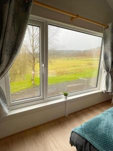 1 Bedroom Log Cabin in Parc Pen y Bryn Sleep 2 3