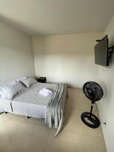 Caverna Suítes - Suítes na praça matriz